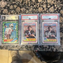 1984 Topps Usfl Steve Young Rcs Both Autod And Both Graded Very High As Well As A 1986 Topps Jerry Rice Rc Graded Extremely High Bgs 8.5!