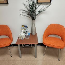 2 Chairs And A Small Table