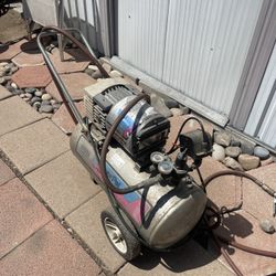 Air Compressor  Easy To Move With Handle And Large Tires 