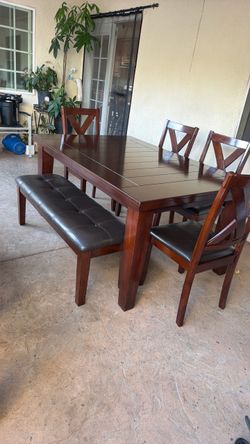 Dining table and 4 chairs one bench
