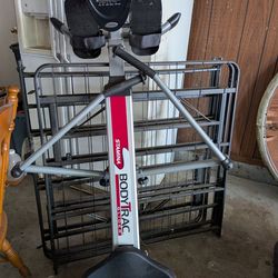 Body trac rowing machine