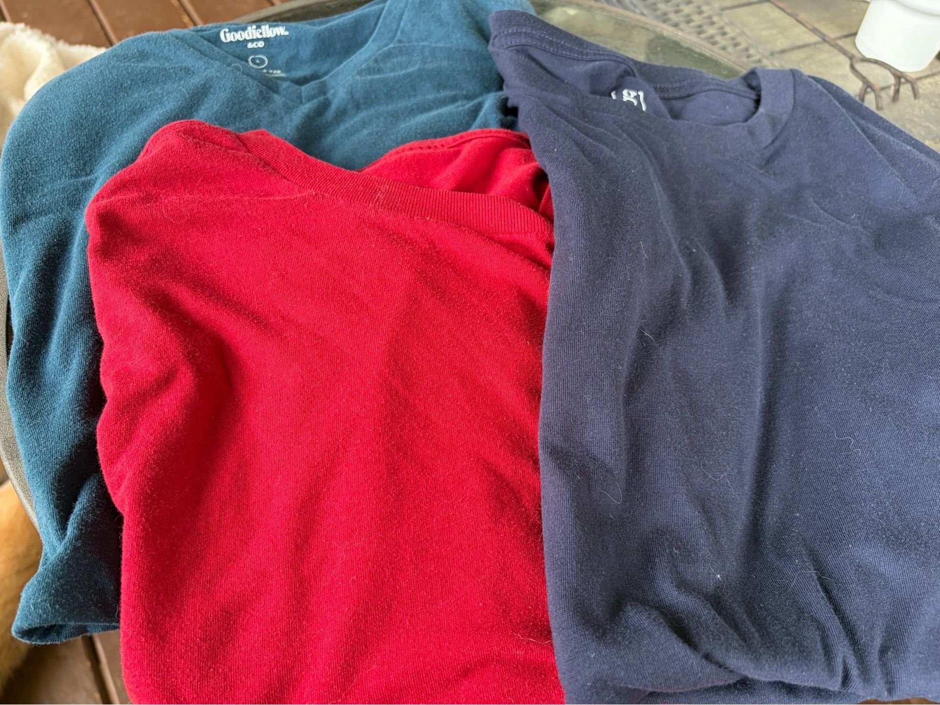Tees. $1 each.