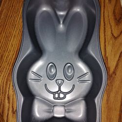 This item is a Wilton Bunny Rabbit Cake Pan, a non-stick metal baking mold !