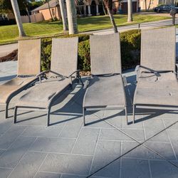 Aluminum. Structurally Sound Loungers NEED New Fabric.