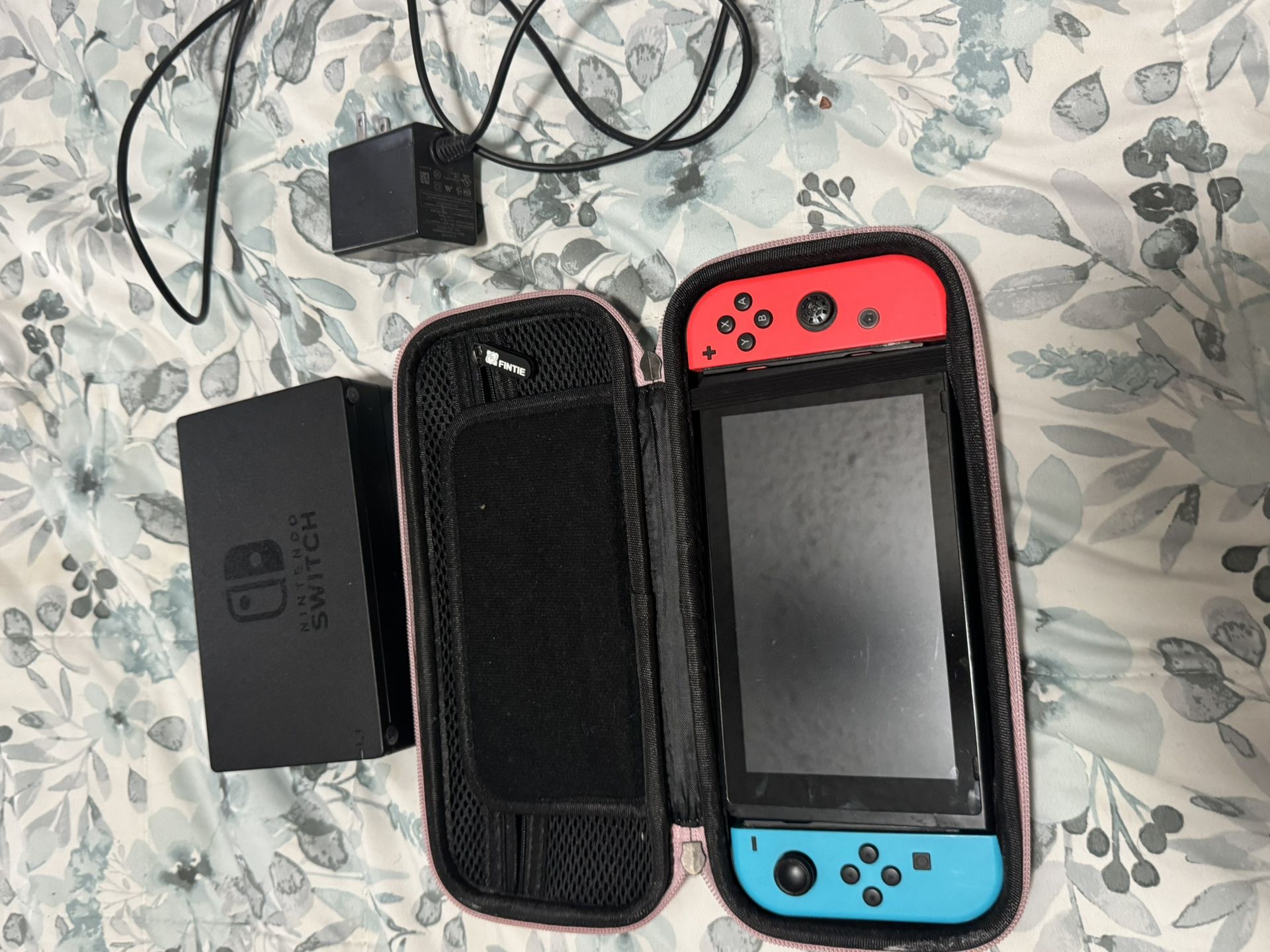 Nintendo Switch with Neon Blue and Neon Red Joy-Con