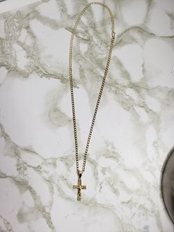 Gold chain with charm