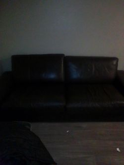 Large, dark brown, leather couch.