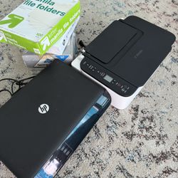 2 Printers And 3 Blocks Of Paper 