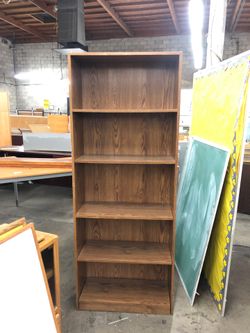 6’ 5 shelf cabinet. $20