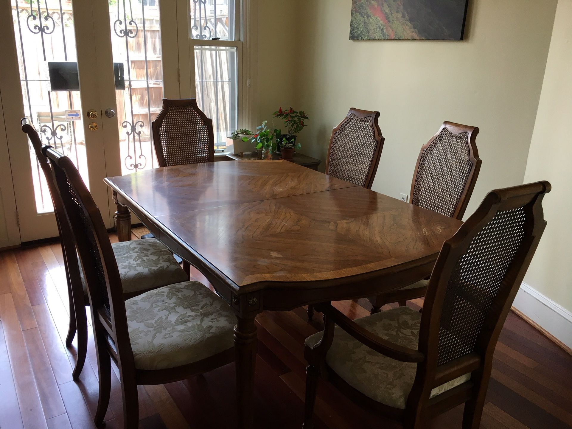 A dining table with 6 chairs