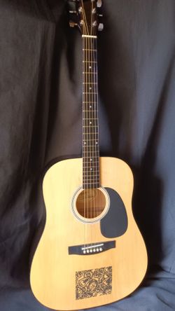 Squier by fender acoustic guitar