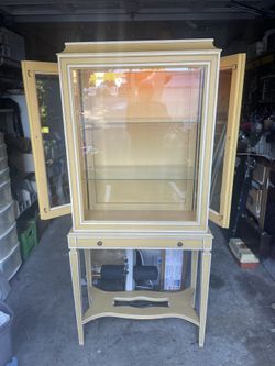 Antique Display Cabinet With Two Shelves And A Light. Both Side Doors Open And Front Drawer Works Perfectly.