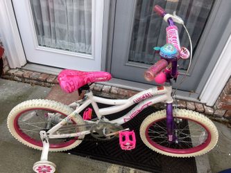 Like new of NEXT 18" girl's bike with training wheels.
