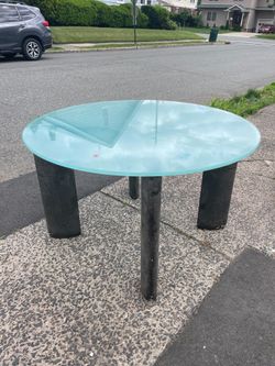 Round glass topped table