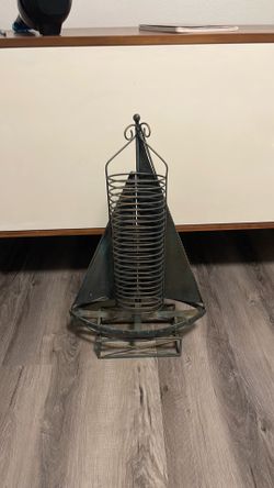 Vintage, ship-shaped wrought iron CD holder/can be used for umbrella holder 16” wide, 27” wide