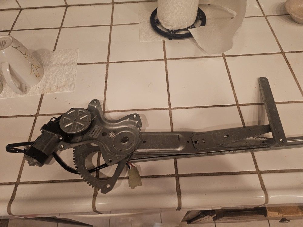 Front Drivers Window Motor Regulator