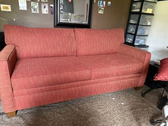 Nice orange couch for sale