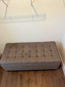 Grey storage ottoman