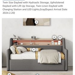 Twin Bed Frame Upholstered With Electric And Ucb Ports In The Headboard..