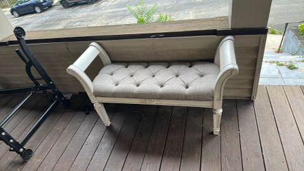 White cushioned bench