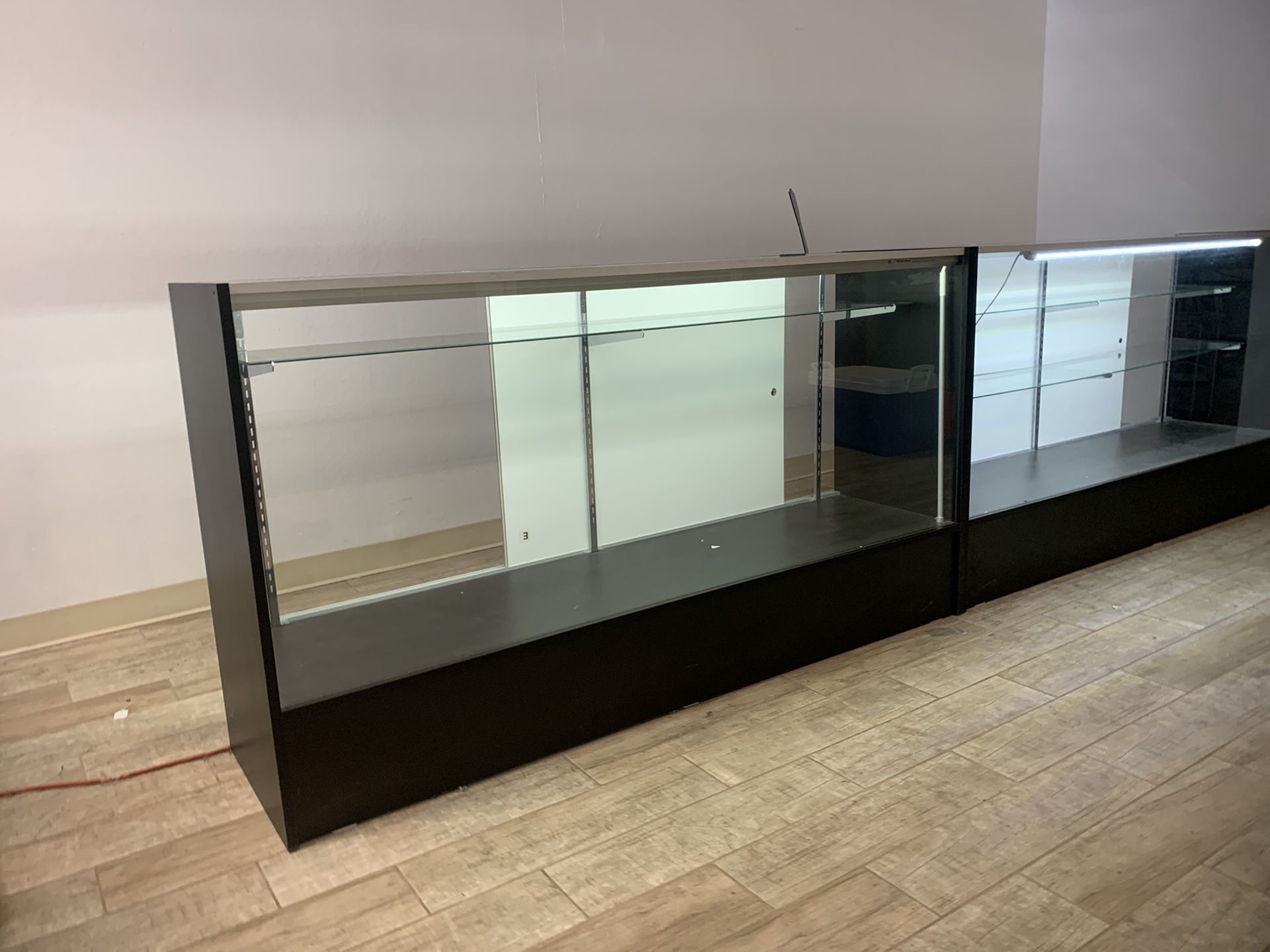 Tw display cases available. Lights and cord. $350