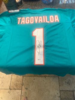 Autographed jersey by Miami Dolphins player TUA TAGORAILOA authentication