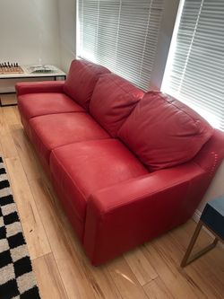 Red leather sofa and leather lazy boy