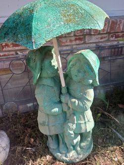 Boy And Girl  With Dog Under Umbrella Statue + Fountain