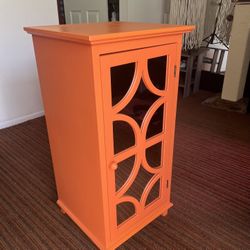 Bright Orange Cabinet with Mirrored Door