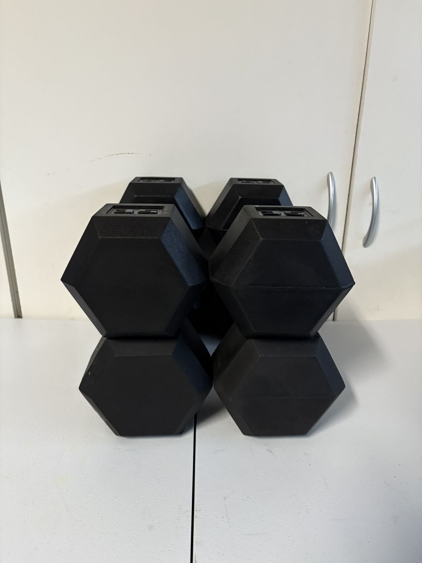 Brand new Pairs of 35 and 40 lbs dumbbells