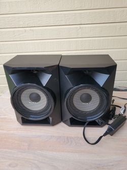 Sony Bluetooth Wireless Speaker System. 2 speakers. Plus Bluetooth Receiver And Power Adapter.