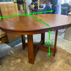 Counter Height Oval / Round Table w / Flip up Leaf ( Berkline Furniture)  Berkline Furniture, solid wood, has a flip up hidden l