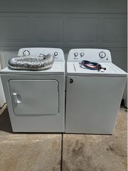 Amana-top load washer and electric dryer.