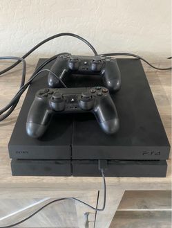 PS4 console with 2 controllers