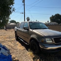 Ford F150  año 2003, placas plan( PNO)