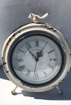 Rustic clock with bird