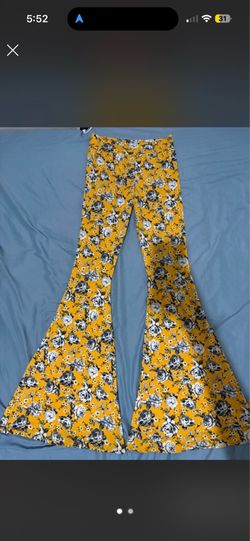 Yellow floral flare pants with black/white roses #floral #boho