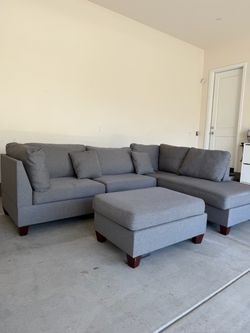 Gray L-Shaped Sectional Sofa with Matching Ottoman β 103β x 75β