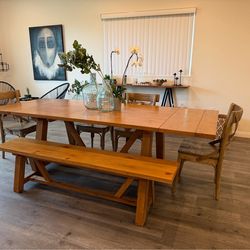 Solid wood farmhouse style dining table set.