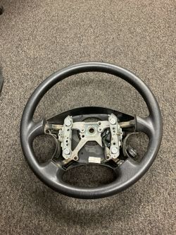 1996-99  SUBARU LEGACY OUTBACK STERING WHEEL WITH CRUISE CONTROL SWITCH USED OEM