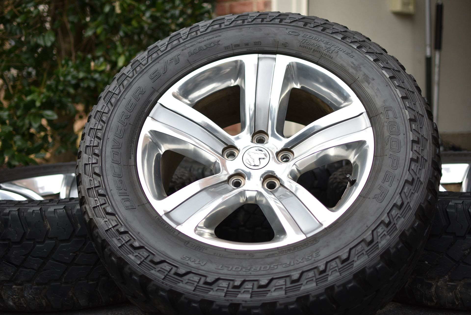 20" RAM 1500 SPORT Wheels & 35" Cooper LT Load Range E Tires