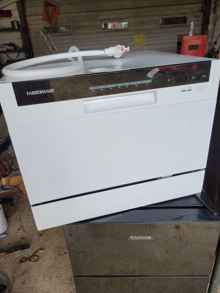 FARBERWARE  COUNTERTOP DISHWASHER HOOKS TO SINK . NEEDS HOSE . COST 440.00 WILL TAKE 175.00  OR MAKE OFFER