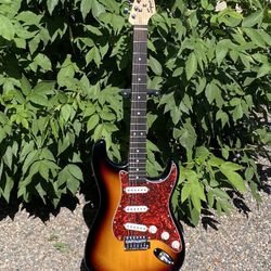 2008 Fender Squier Stratocaster Tobacco Sunburst SSS with Tortoise Shell Pickguard and tremolo cover