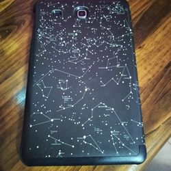 LIKE NEW SAMSUNG GALAXY TAB E WITH LEATHER HOROSCOPE CASE. WORKS GREAT