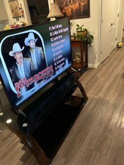 Television y mueble de tele buenas condiciones