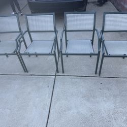Outdoor Dining Table and 4 Matching Chairs.