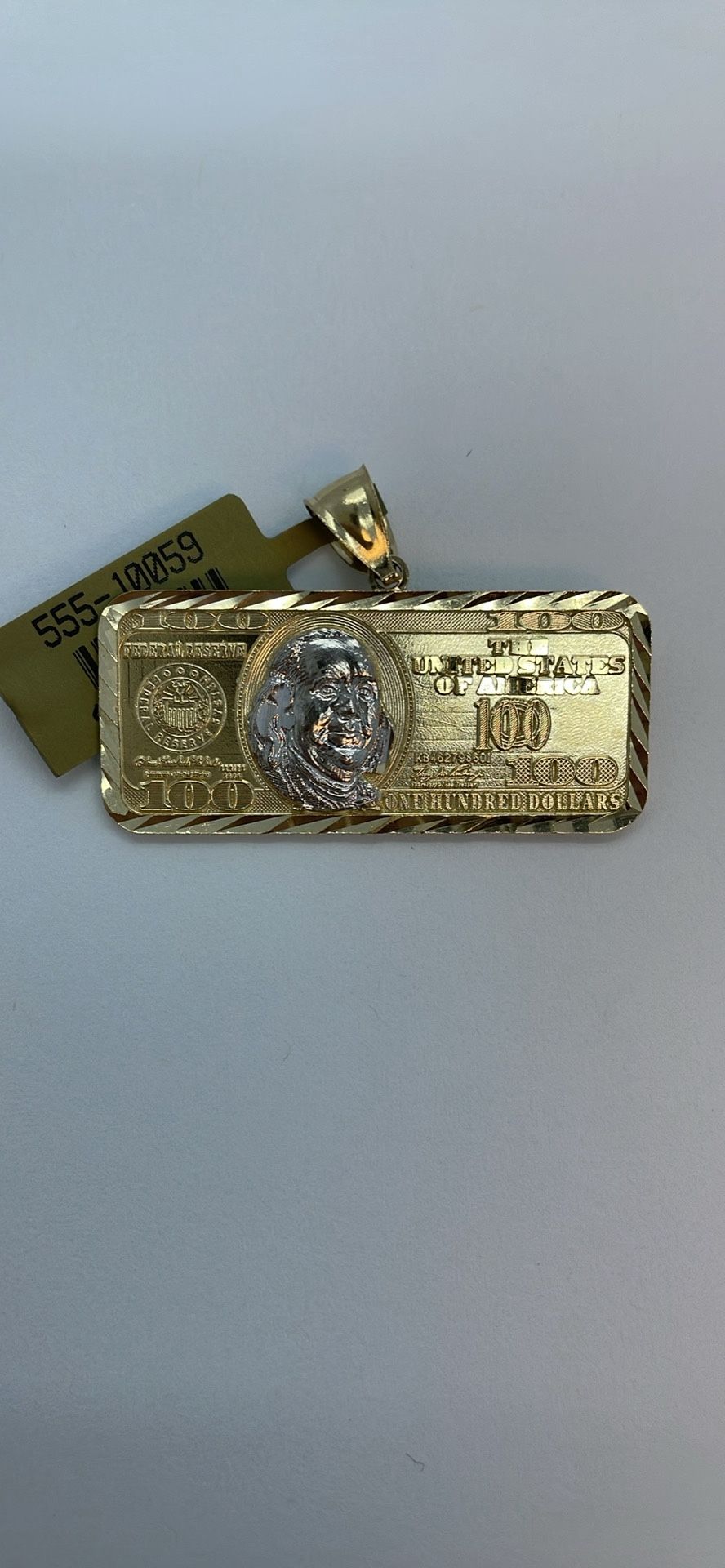 14K Gold New. Dollar Pendant  