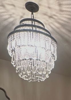 Tiered chandelier with crystals