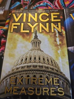 2 hardback books written by Vince Flynn. "Act of Treason" and "Extreme Measures".
