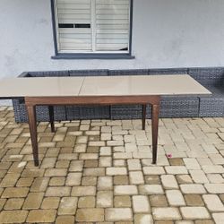 Outdoor WICKER PATIO SECTIONAL  AND Here’s a strong, clean OfferUp listing for your table that will move fast:


---

Mid-Century Style Extendable Din